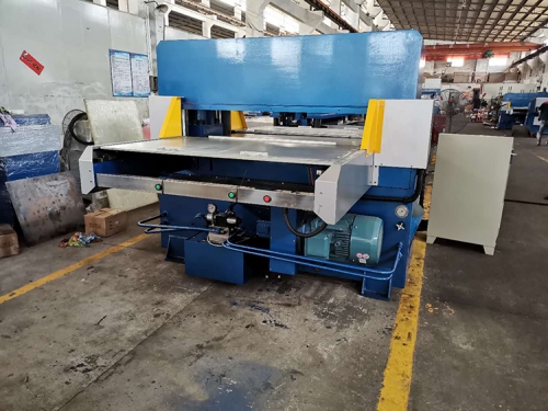 Double-sided automatic cutting machine with external valve seat
