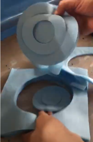 Disposable surgical drape cutting machine